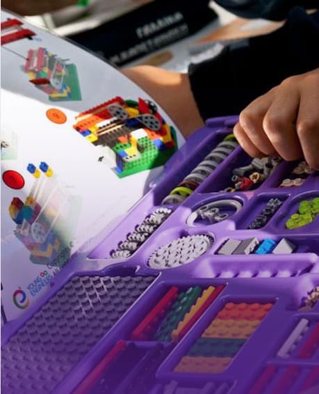 A child building with a hands-on engineering kit
